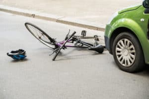Damaged bicycle laying in the road