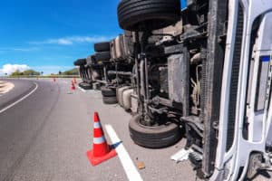 Commercial truck rolled over on highway