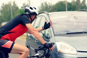 car and bike colliding