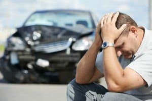 man upset right after rental car accident