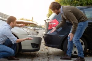 two drivers arguing over car accident