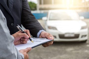 a car owner filing a report claim form process after accident