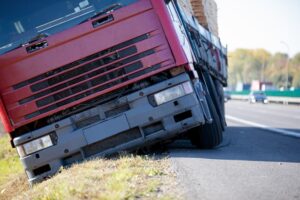Truck gets stranded on the side of the road after an accident