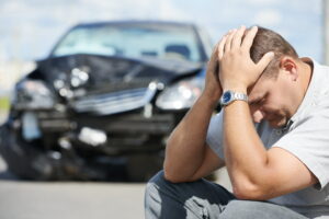 Man injured after accident holds his head