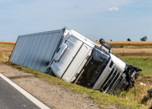 truck overturned on the side of the road
