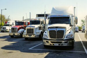 trucks parked orderly in an unloading area
