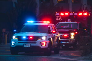 police truck arriving at a crash scene