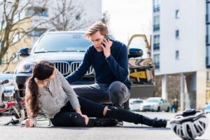 Man supporting woman after an acciden