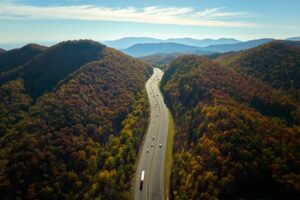 aerial image of interstate in between mountains