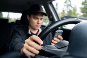 Man texts while driving