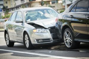 cars collide on the road