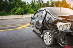crashed car in the middle of the road